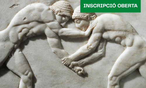 Un relleu esculpit en pedra on hi ha dos homes nus que lluiten