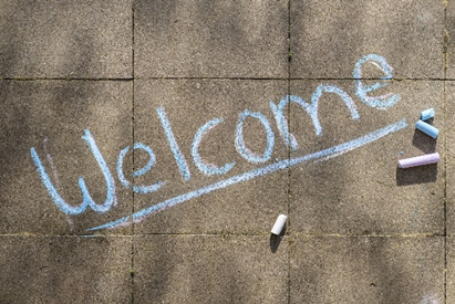 Word Welcome written with chalk