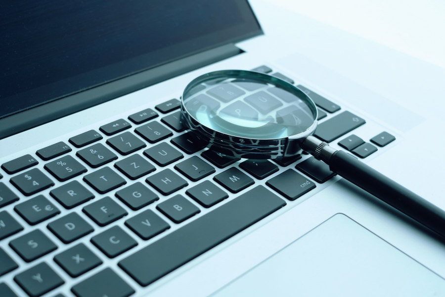 Magnifying glass on a laptop