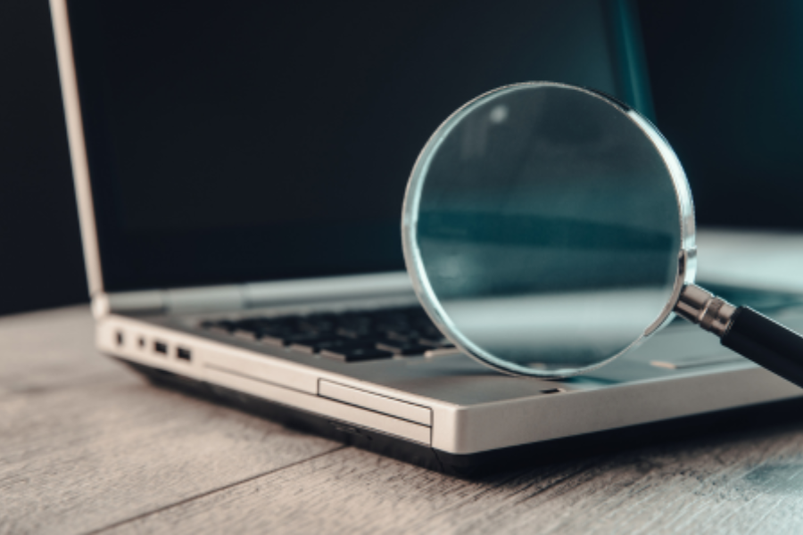 Magnifying glass on a laptop