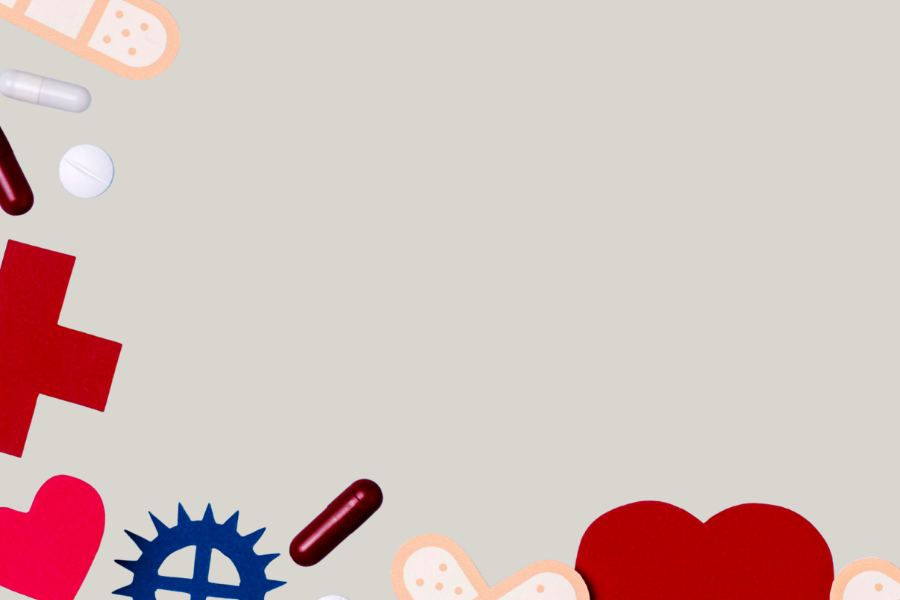 fondo gris con stickers en forma de corazón, tiritas y medicamentos